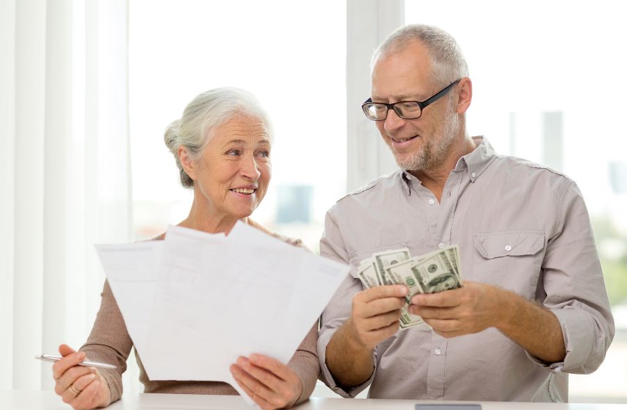 elderly couple checking eligibility and contribution limits